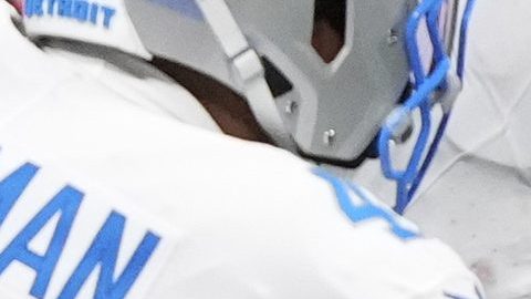 Detroit Lions safety Morice Norris (26) is hit in the helmet by Atlanta Falcons running back Nathan Carter (38) during the second half of an NFL preseason football game Friday, Aug. 8, 2025, in Atlanta. (AP Photo/Brynn Anderson)