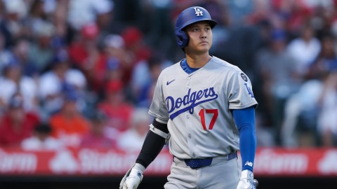 Los Angeles Dodgers designated hitter Shohei Ohtani looks on after striking out during the third inning of a baseball game against the Los Angeles Angels, Monday, Aug. 11, 2025, in Anaheim, Calif. (AP Photo/Jessie Alcheh)