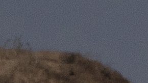 An Israeli tank moves through an area near the Israeli-Gaza border, as seen from southern Israel, Wednesday, Aug. 20, 2025. (AP Photo/Maya Levin)