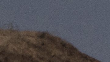 An Israeli tank moves through an area near the Israeli-Gaza border, as seen from southern Israel, Wednesday, Aug. 20, 2025. (AP Photo/Maya Levin)