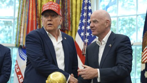 President Donald Trump, left, shakes the hand of FIFA President Gianni Infantino at the conclusion of an announcement in the Oval Office of the White House, Friday, Aug. 22, 2025, in Washington. (AP Photo/Jacquelyn Martin)