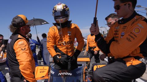 Pato O'Ward, center, stands in his car before the start of an IndyCar auto race Sunday, Aug. 31, 2025, at Nashville Superspeedway in Lebanon, Tenn. (AP Photo/George Walker IV)