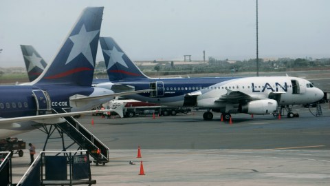 Chile's LAN airplanes are seen in the tarmac of Jorge Chavez International Airport in Lima, Saturday, Feb. 27, 2010. A 8.8-magnitude earthquake struck central Chile and the epicenter was 70 miles (115 kilometers) from Concepcion, Chile's second-largest city. Santiago airport has been shut down and will remain closed for at least the next 24 hours. (AP Photo/Karel Navarro)