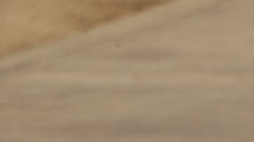 Students try to shield themselves from the sunlight at the Griffith Observatory gardens in Los Angeles Friday, July 14, 2023. Over a third of Americans are under extreme heat advisories, watches, and warnings as a blistering heatwave continues across the Southwest and California. The sweltering conditions were expected to keep building Friday and through the weekend. Forecasters say some California residents should prepare for the hottest weather of the year. (AP Photo/Damian Dovarganes)