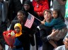 Family members welcome their relatives as new U.S. citizens after taking the citizenship oath during naturalization ceremonies at a U.S. Citizenship and Immigration Services (USCIS) ceremony in Los Angeles, Wednesday, Sept. 20, 2017. (AP Photo/Damian Dovarganes)