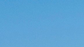 Protesters are blocked by federal immigration agents during a raid in the agriculture area of Camarillo, Calif., Thursday, July 10, 2025. (AP Photo/Michael Owen Baker)