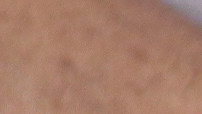 FILE - A handcuffed man, arrested for alleged gang connections, waits to be transferred to a prison at the police delegation of San Bartolo in Soyapango, El Salvador, Aug. 16, 2022. Congress voted on Dec. 14 to extend President Nayib Bukele’s emergency powers to crack down on gangs for the ninth time. (AP Photo/Salvador Melendez, File)