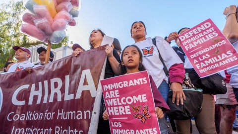 Members of Coalition for Humane Immigrant Rights (CHIRLA) join labor unions, faith organizations, and other immigrant rights and social justice organizations to mark "International Migrants Day" with a rally on Wednesday, Dec. 18, 2024, in Los Angeles. (AP Photo/Damian Dovarganes)