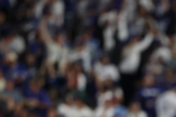 Shohei Ohtani recorre las bases luego de conectar un jonrón de dos carreras en el sexto inning, su segundo del juego 1 de la serie de comodines entre Dodgers y Reds en Los Ángeles.