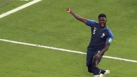 France's Samuel Umtiti celebrates after scoring the opening goal during the semifinal match between France and Belgium at the 2018 soccer World Cup in the St. Petersburg Stadium in St. Petersburg, Russia, Tuesday, July 10, 2018. (AP Photo/Thanassis Stavrakis)