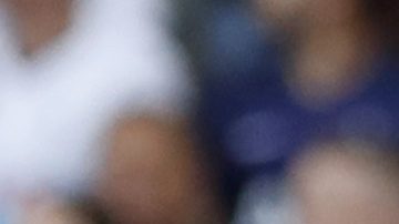 Tottenham's Son Heung-min, left, shakes hands with Tottenham's manager Mauricio Pochettino after scoring his side's third goal during their English Premier League soccer match between Tottenham Hotspur and Crystal Palace at White Hart Lane stadium in London, Saturday, Sept. 14, 2019. (AP Photo/Alastair Grant)