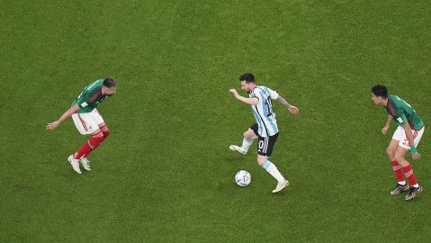 Argentina's Lionel Messi, centre, controls the ball during the World Cup group C soccer match between Argentina and Mexico, at the Lusail Stadium in Lusail, Qatar, Saturday, Nov. 26, 2022. (AP Photo/Pavel Golovkin)