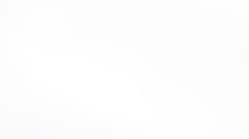 FILE - A participant hangs from the Olympic rings while posing for a teammate at Olympic Park ahead of the 2014 Winter Olympics, Wednesday, Feb. 5, 2014, in Sochi, Russia. A commission charged with reviewing the Olympic system in the United States recommended in a report Friday, March 1, 2024, that Congress rework key facets of the U.S. Center for SafeSport, including making it completely independent of the U.S. Olympic and Paralympic Committee and reimagining the way it deals with cases in the grassroots. (AP Photo/Robert F. Bukaty, File)