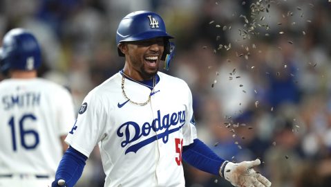 Los Angeles Dodgers' Mookie Betts is hit with seeds after hitting a two-run home run during the third inning of a baseball game against the Colorado Rockies, Tuesday, Sept. 9, 2025, in Los Angeles. (AP Photo/Mark J. Terrill)