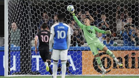 Charlotte FC goalkeeper Kristijan Kahlina (1) stops a penalty shot from Inter Miami forward Lionel Messi, left, during the first half of an MLS soccer match, Saturday, Sept. 13, 2025, in Charlotte, N.C. (AP Photo/Erik Verduzco)