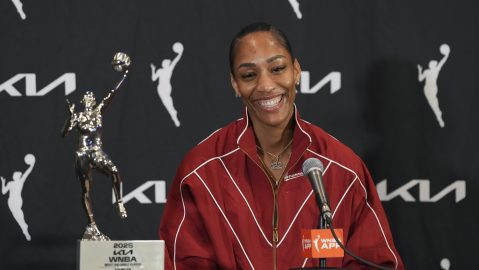 Las Vegas Aces center A'ja Wilson (22) speaks during a press conference on receiving the 2025 WNBA Most Valuable Player award before Game 1 in the semifinals of the WNBA basketball playoffs Sunday, Sept. 21, 2025, in Las Vegas. (AP Photo/Candice Ward)