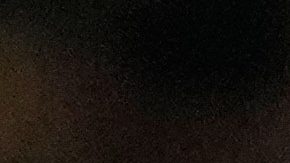 Lecce's goalkeeper Christian Fruechtl stops the ball from AC Milan's Santiago Gimenez, center, during an Italian Cup qualifying soccer match between AC Milan and Lecce, at the San Siro stadium in Milan, Italy, Tuesday, Sept. 23, 2025. (AP Photo/Luca Bruno)