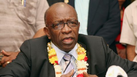 FILE - Suspended FIFA executive Jack Warner gestures during a news conference at the airport in Port-of-Spain, Trinidad and Tobago, June 2, 2011. (AP Photo/Shirley Bahadur, File)