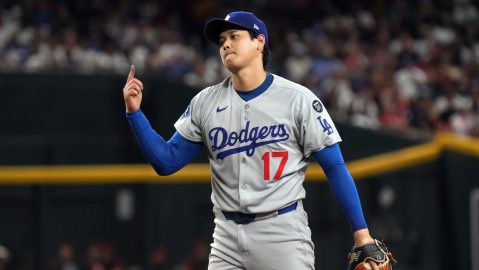 Los Angeles Dodgers pitcher Shohei Ohtani reacts after striking out Arizona Diamondbacks' James McCann in the third inning of a baseball game, Tuesday, Sept. 23, 2025, in Phoenix. (AP Photo/Rick Scuteri)