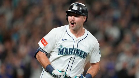 Seattle Mariners' Cal Raleigh reacts after hitting his 60th home run during the eighth inning of a baseball game against the Colorado Rockies, Wednesday, Sept. 24, 2025, in Seattle. (AP Photo/Ryan Sun)