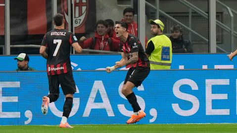 AC Milan's Christian Pulisic, centre, celebrates after scoring his side's second goal during the Serie A soccer match between AC Milan and Napoli at the San Siro stadium in Milan, Italy, Sunday, Sept. 28, 2025. (AP Photo/Luca Bruno)