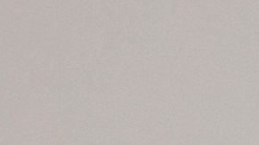 This Saturday, April 20, 2019 photo a woman walks out of the U.S. Immigration and Enforcement Processing Center operated by GEO Group, Inc. (GEO) a Florida-based company specializing in privatized corrections in Adelanto, Calif. (AP Photo/Richard Vogel)