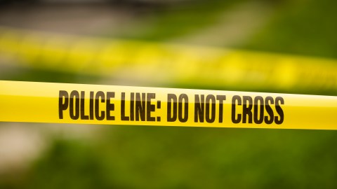 Tape cordons off the scene of a shooting in the Ogontz section of Philadelphia, Thursday, Aug. 15, 2019. (AP Photo/Matt Rourke)