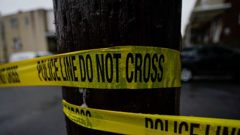 Police tape cordons off the scene of a fatal shooting in Philadelphia, Friday, April 28, 2023. (AP Photo/Matt Rourke)