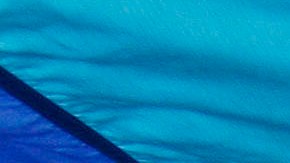 Participants raise a giant gay pride flag during the annual Pride March in Manila, Philippines, Saturday, Dec. 3, 2011. Lesbians, gays, bisexual and transgenders called for the urgent need to pass the anti-discrimination bill and for government protection from hate crimes committed against them. (AP Photo/Pat Roque)