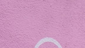 Flor Melendrez, executive Director, CLEAN Carwash Worker Center, at podium, is joined by family members of carwash workers and community leaders at a news conference in West Los Angeles on Thursday, Sept. 11, 2025, to denounce U.S. Immigration and Customs Enforcement detentions at the now-shuttered La Cienega Carwash. (AP Photo/Damian Dovarganes)