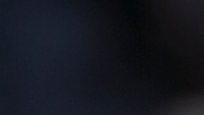 Yesenia Del Carmen 8, carries a cross reading "No to the Deportations," "as she and her grandmother join an immigrant-rights supporters "Procession of the Cross" walk, led by U.S.-born children from the Federal building to the Cathedral of Our Lady of the Angels in Los Angeles, Friday, Apr. 18, 2014. Immigrants urged the Obama administration today to stop deportations that they said are splitting up families. Del Carmen worries her father could be deported while at work. (AP Photo/Damian Dovarganes)