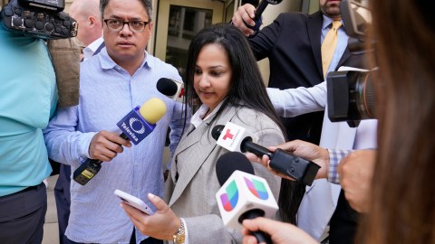 Mariel Colon, an attorney for the wife of Mexican drug kingpin Joaquin “El Chapo”, Emma Coronel Aispuro, walks past reporters outside federal court Washington, Thursday, June 10, 2021. (AP Photo/Susan Walsh)