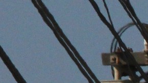 FILE - In this Nov. 25, 2018 file photo Utility crews repair overhead lines along Pacific Coast Highway just west of Malibu, Calif., where the Woolsey Fire burned down from the Santa Monica Mountains to the water's edge at Leo Carrillo State Beach. Southern California Edison announced in its quarterly earnings report that its equipment probably caused the November 2018 Woolsey Fire that raged from north of Los Angeles through Malibu to the sea, killing three people and burning more than 1,600 homes and other buildings. (AP Photo/John Antczak,File)