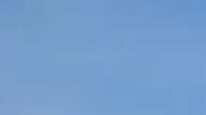 El nadador chino Tianchen Lan, compitiendo en un relevo en aguas abiertas en el Campeonato Mundial de Acuáticos de Singapur el 20 de julio.