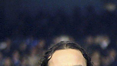 Messi y Rafa Márquez en un partido del FC Barcelona.