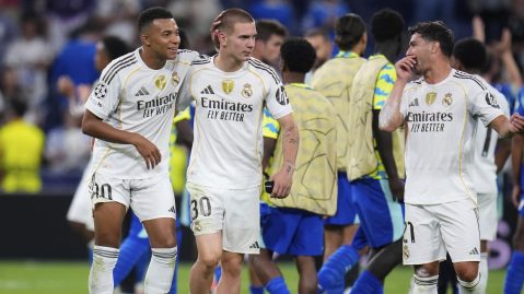 From left, Real Madrid's Kylian Mbappe, Franco Mastantuono and Brahim Diaz celebrate at the end of a Champions League opening phase soccer match between Real Madrid and Marseille at Santiago Bernabeu stadium, in Madrid, Tuesday, Sept. 16, 2025. (AP Photo/Manu Fernandez)