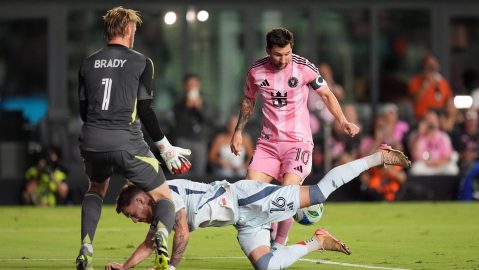 Inter Miami forward Lionel Messi (10) attempts to score past Chicago Fire goalkeeper Chris Brady (1) and defender Joel Waterman (16) during the first half of an MLS soccer match, Tuesday, Sept. 30, 2025, in Fort Lauderdale, Fla. (AP Photo/Rebecca Blackwell)