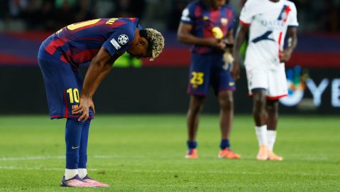 Barcelona's Lamine Yamal, left, reacts at the end of the Champions League opening phase soccer match between Barcelona and Paris Saint-Germain at the Lluis Companys Olympic Stadium in Barcelona, Spain, Wednesday, Oct. 1, 2025. (AP Photo/Joan Monfort)