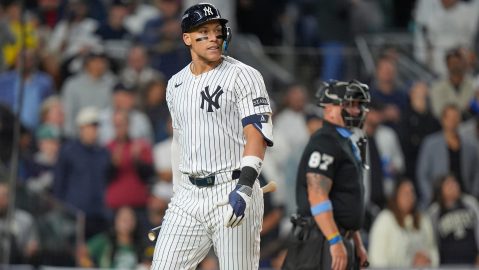 New York Yankees outfielder Aaron Judge (99) reacts after striking out against the Boston Red Sox with a man on second base to end the seventh inning of Game 2 of an American League wild-card baseball playoff series, Wednesday, Oct. 1, 2025, in New York. (AP Photo/Frank Franklin II)