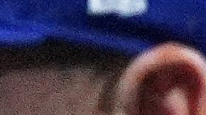 Los Angeles Dodgers relief pitcher Roki Sasaki high-fives teammates after the team's win in Game 2 of baseball's National League Division Series against the Philadelphia Phillies, Monday, Oct. 6, 2025, in Philadelphia. (AP Photo/Matt Rourke)