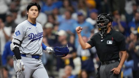 Los Angeles Dodgers' Shohei Ohtani strikes out against the Milwaukee Brewers during the eighth inning in Game 2 of baseball's National League Championship Series, Tuesday, Oct. 14, 2025, in Milwaukee. (AP Photo/Ashley Landis)