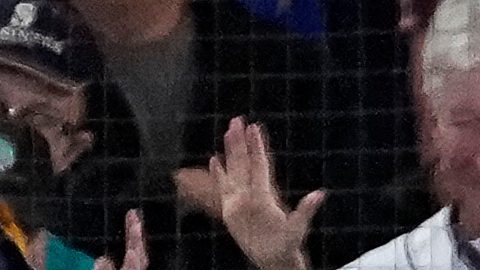 Seattle Mariners' Eugenio Suárez celebrates his solo home run against the Toronto Blue Jays during the second inning in Game 5 of baseball's American League Championship Series, Friday, Oct. 17, 2025, in Seattle. (AP Photo/David J. Phillip)