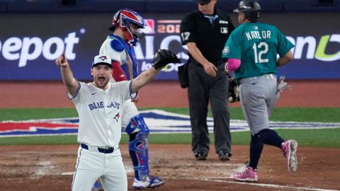 Toronto Blue Jays pitcher Trey Yesavage reacts after an inning-ending double play during the fourth inning in Game 6 of baseball's American League Championship Series against the Seattle Mariners, Sunday, Oct. 19, 2025, in Toronto. (AP Photo/David J. Phillip)