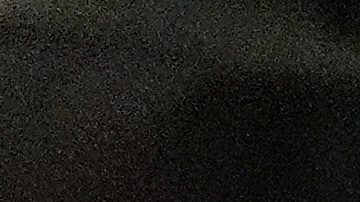 Miami Heat forward Jaime Jaquez Jr. (11) dunks the ball as New York Knicks center Karl-Anthony Towns (32) looks on during the second half of an NBA basketball game, Sunday, Oct. 26, 2025, in Miami. (AP Photo/Rebecca Blackwell)