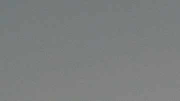 Law enforcement officers in riot gear patrol a street near Los Angeles City Hall in downtown Los Angeles on Monday, June 9, 2025. (AP Photo/Eric Thayer)