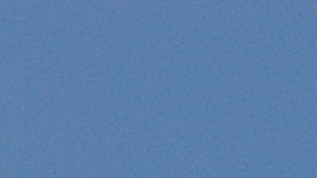 In this photo released by Sam Northrop III, A single engine propeller plane descends from the sky before making an emergency landing on the beach in Jacksonville Beach, Fla. on Saturday, June 9, 2007. The aircraft lost power and the pilot landed the aircraft without injuries to himself, his passenger or anyone on the beach. (AP Photo/Courtesy of Sam Northrop III) **EDITORIAL USE ONLY**