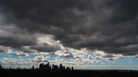 Heavy clouds move over downtown Los Angeles on Sunday, Feb. 26, 2023. (AP Photo/Damian Dovarganes)