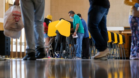 Voters cast their ballots for the California gubernatorial recall election at a vote center set up in Los Angeles Union Station, Tuesday, Sept. 14, 2021, in Los Angeles. (AP Photo/Ringo H.W. Chiu)