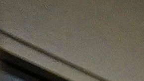 Registered nurse Merri Lynn Anderson puts on her PPE to check on her patient in a COVID-19 unit at St. Joseph Hospital in Orange, Calif., Thursday, Jan. 7, 2021. California health authorities reported Thursday a record two-day total of 1,042 coronavirus deaths as many hospitals strain under unprecedented caseloads. The state's hospitals are trying to prepare for the possibility that they may have to ration care for lack of staff and beds — and hoping they don't have to make that choice. (AP Photo/Jae C. Hong)