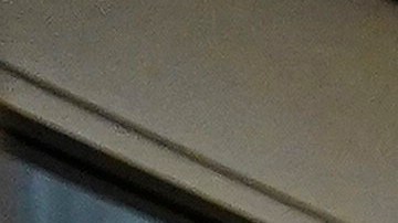 Registered nurse Merri Lynn Anderson puts on her PPE to check on her patient in a COVID-19 unit at St. Joseph Hospital in Orange, Calif., Thursday, Jan. 7, 2021. California health authorities reported Thursday a record two-day total of 1,042 coronavirus deaths as many hospitals strain under unprecedented caseloads. The state's hospitals are trying to prepare for the possibility that they may have to ration care for lack of staff and beds — and hoping they don't have to make that choice. (AP Photo/Jae C. Hong)